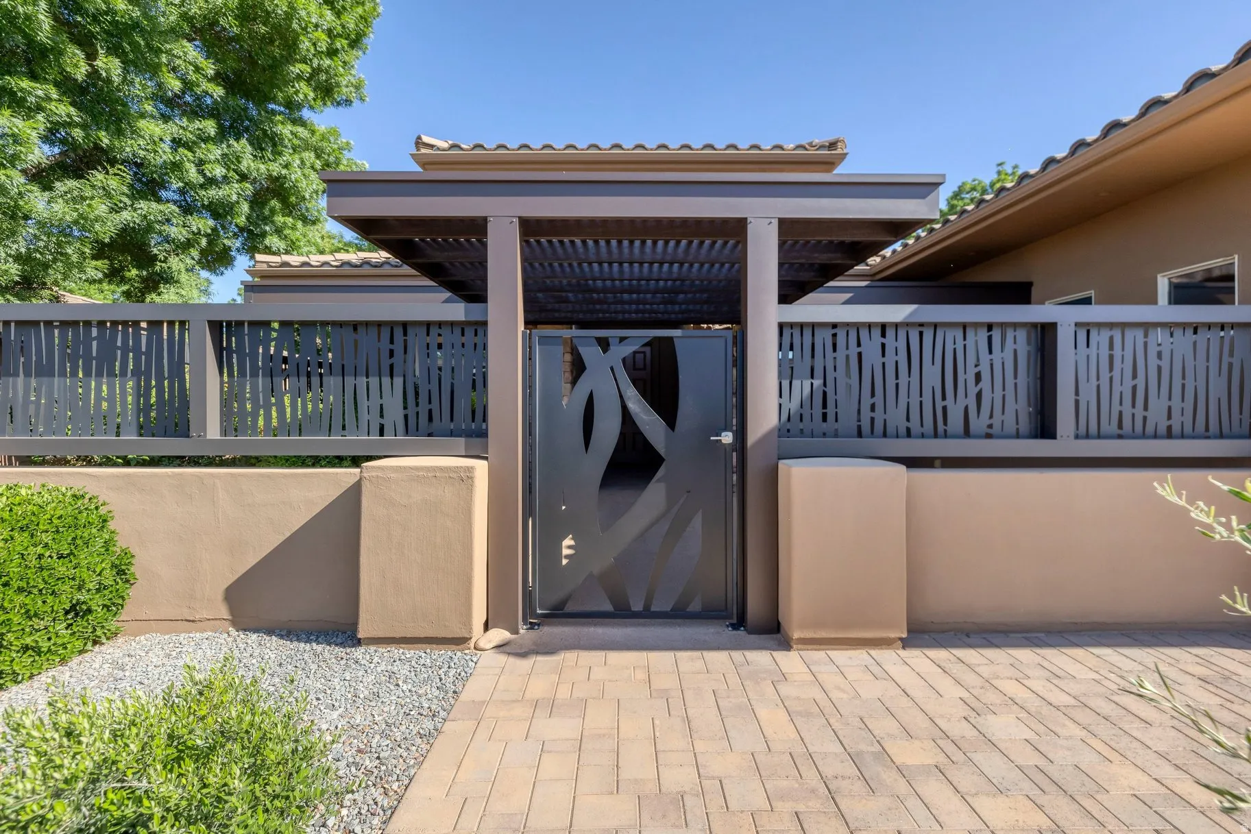 View of patio with a gate
