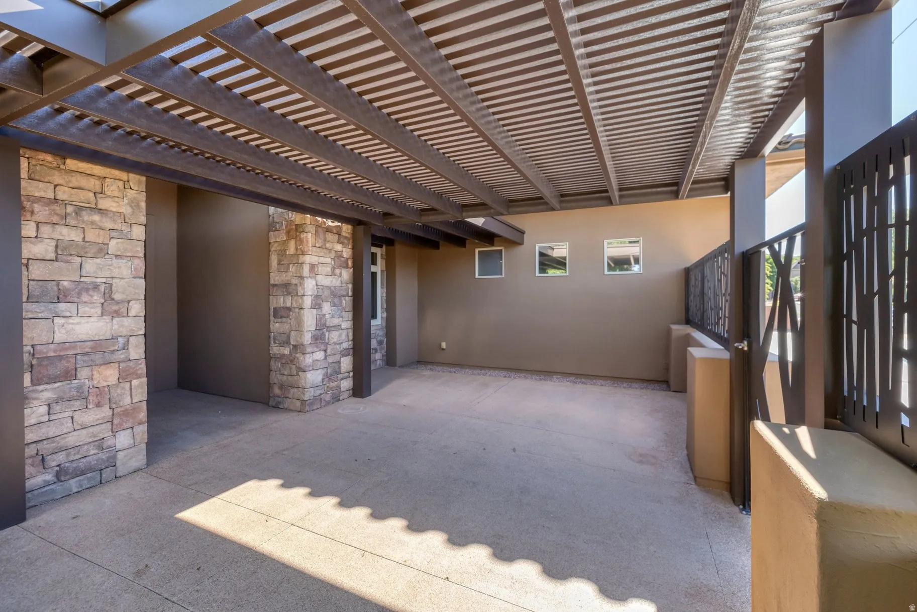 View of patio with a pergola