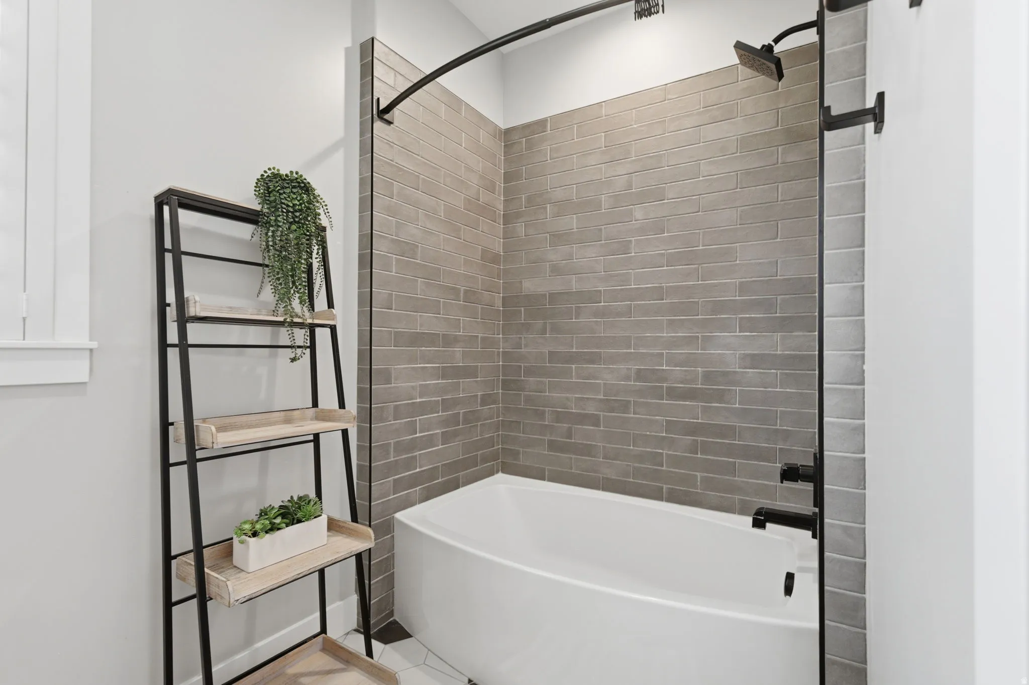 Full bath featuring shower / tub combination