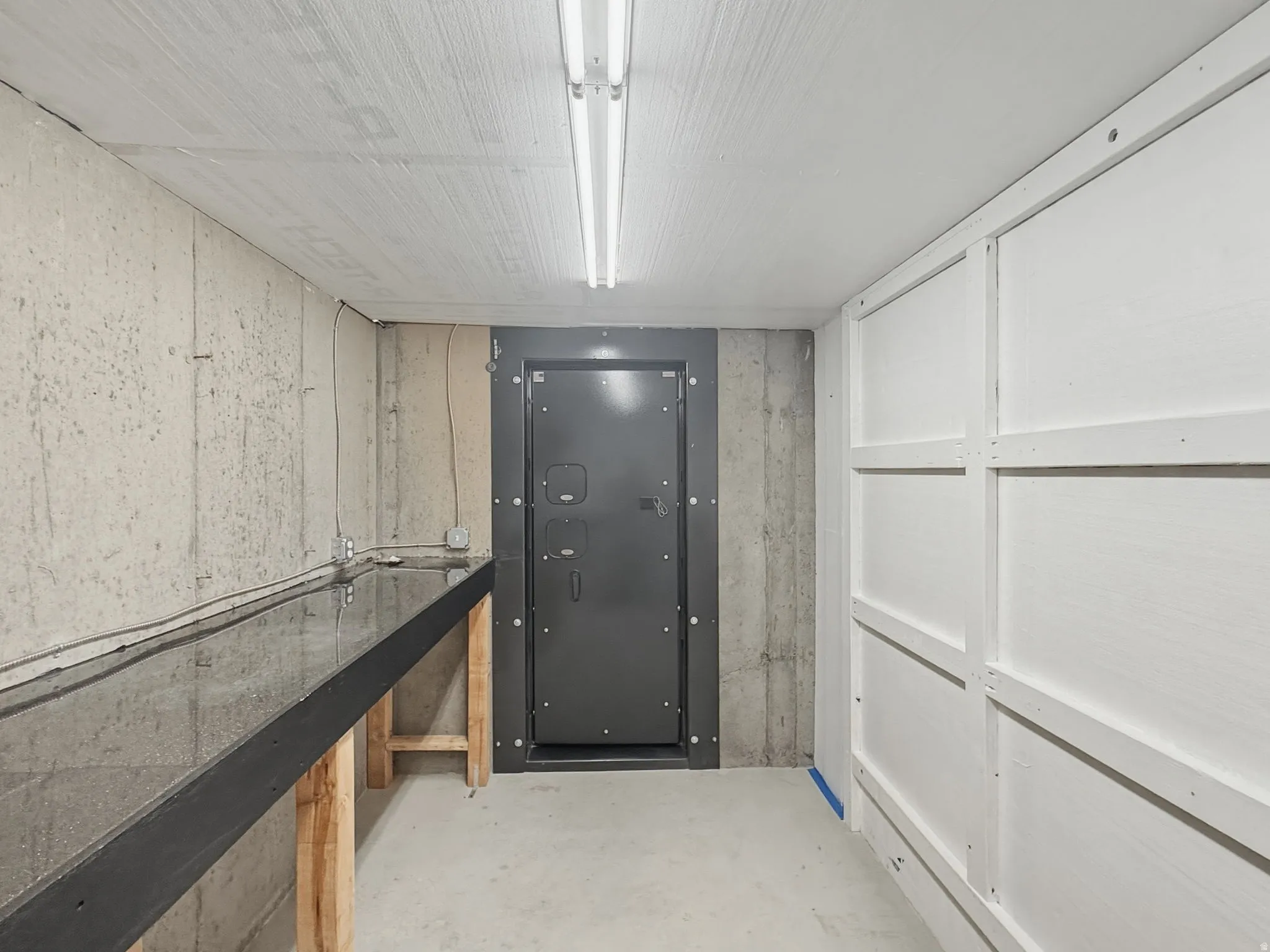 Miscellaneous room with concrete flooring