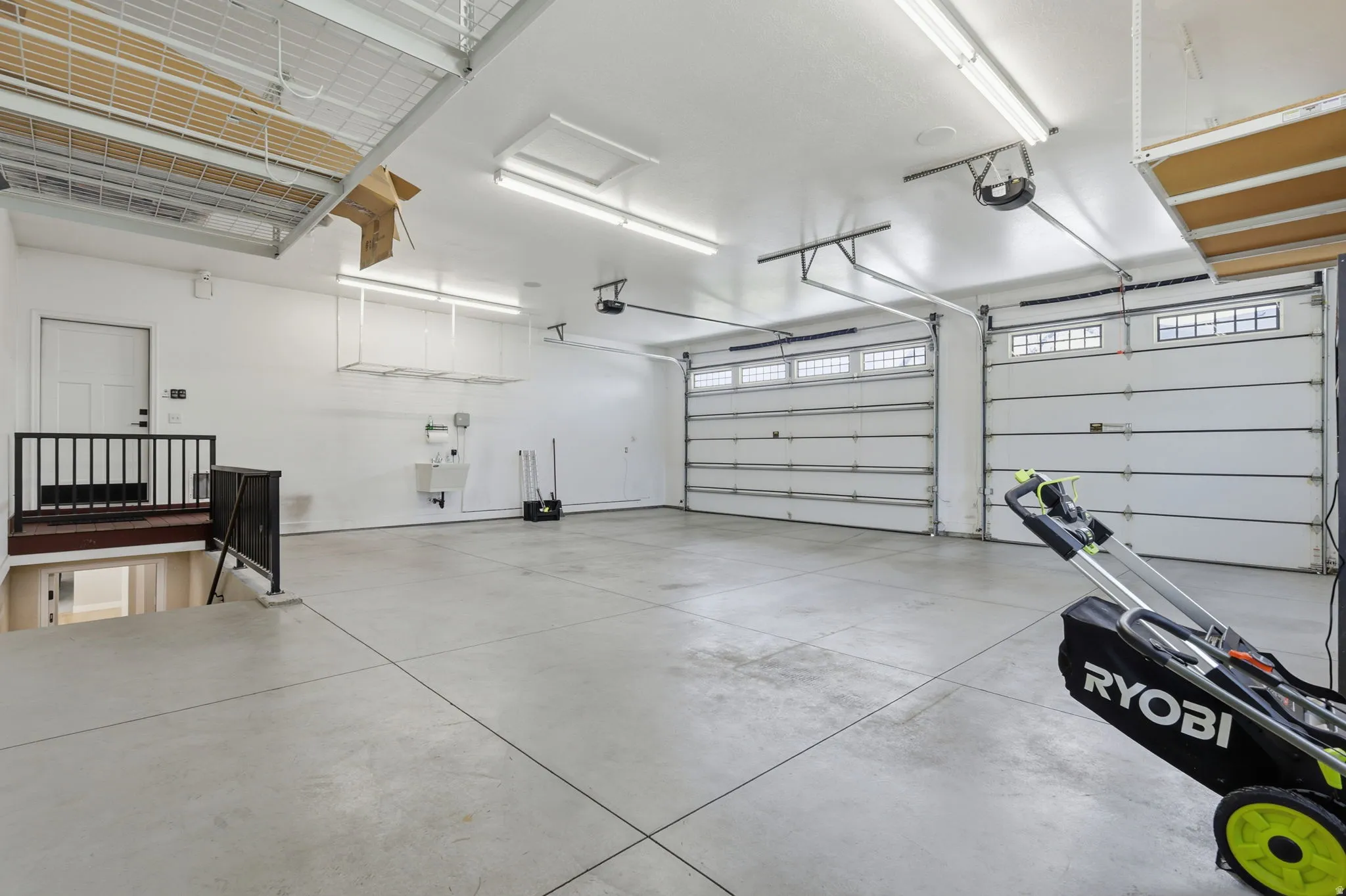 Garage featuring a garage door opener
