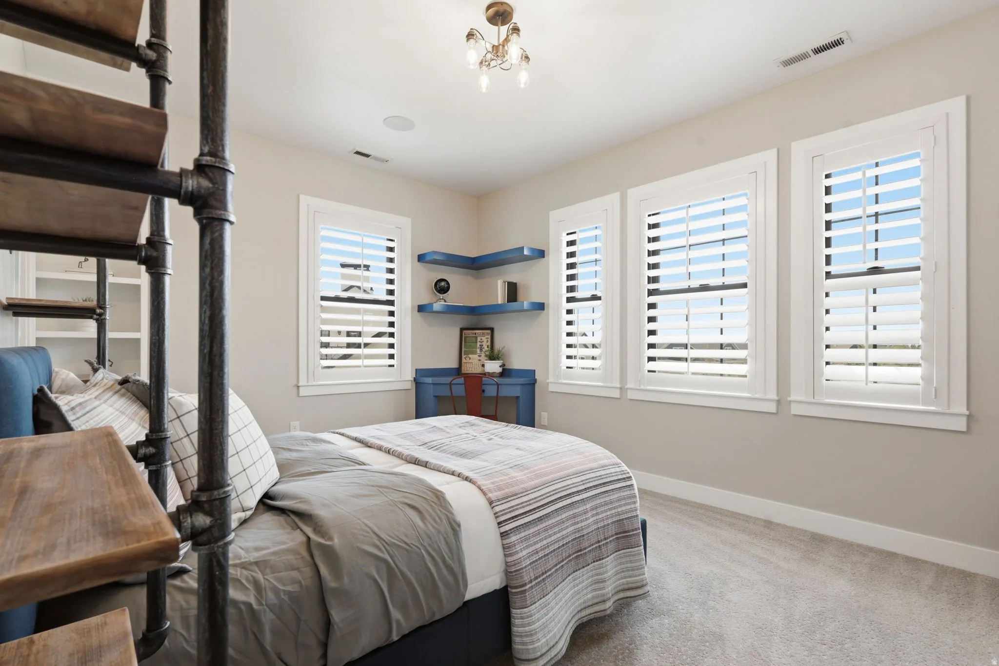 Bedroom with carpet and baseboards