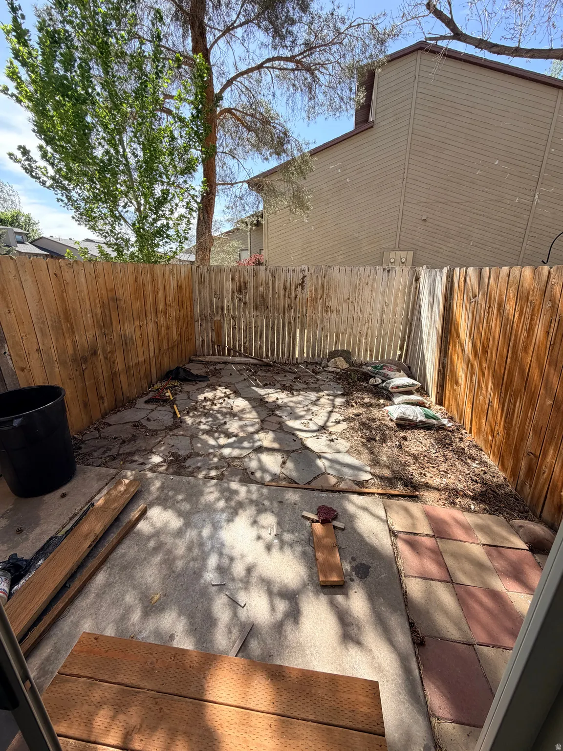 View of fenced backyard