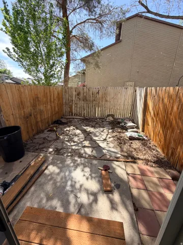 View of fenced backyard