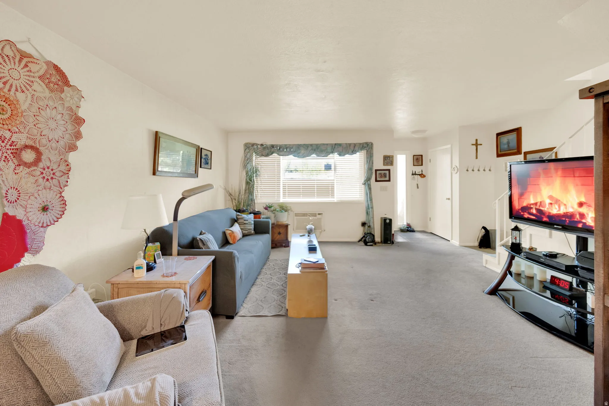 Living room with carpet floors