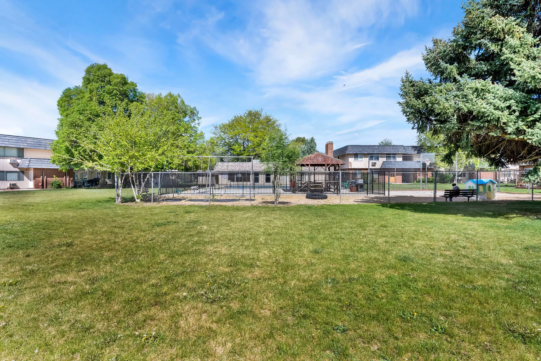 View of yard with a gazebo and a swimming pool