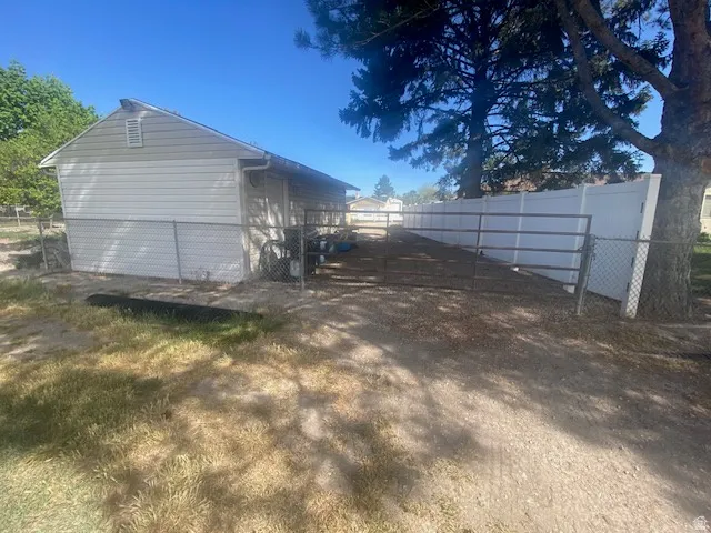 View of where driveway will be from inside the property.