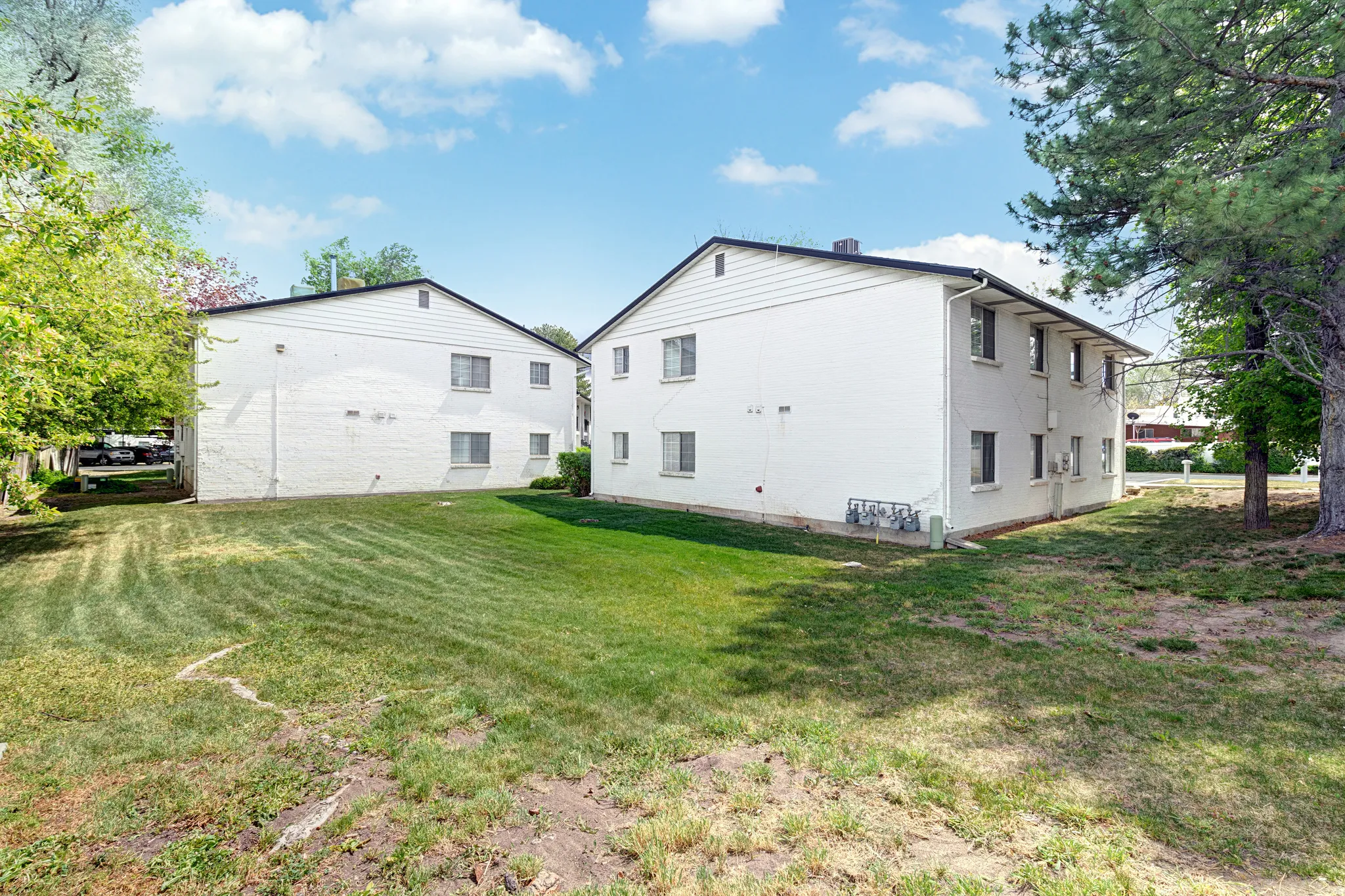 Rear view of property featuring a yard
