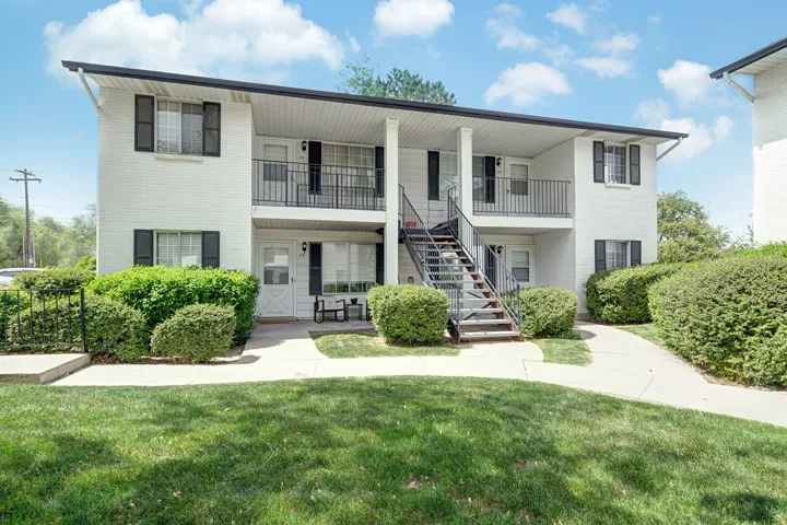 View of apartment building / complex with stairs