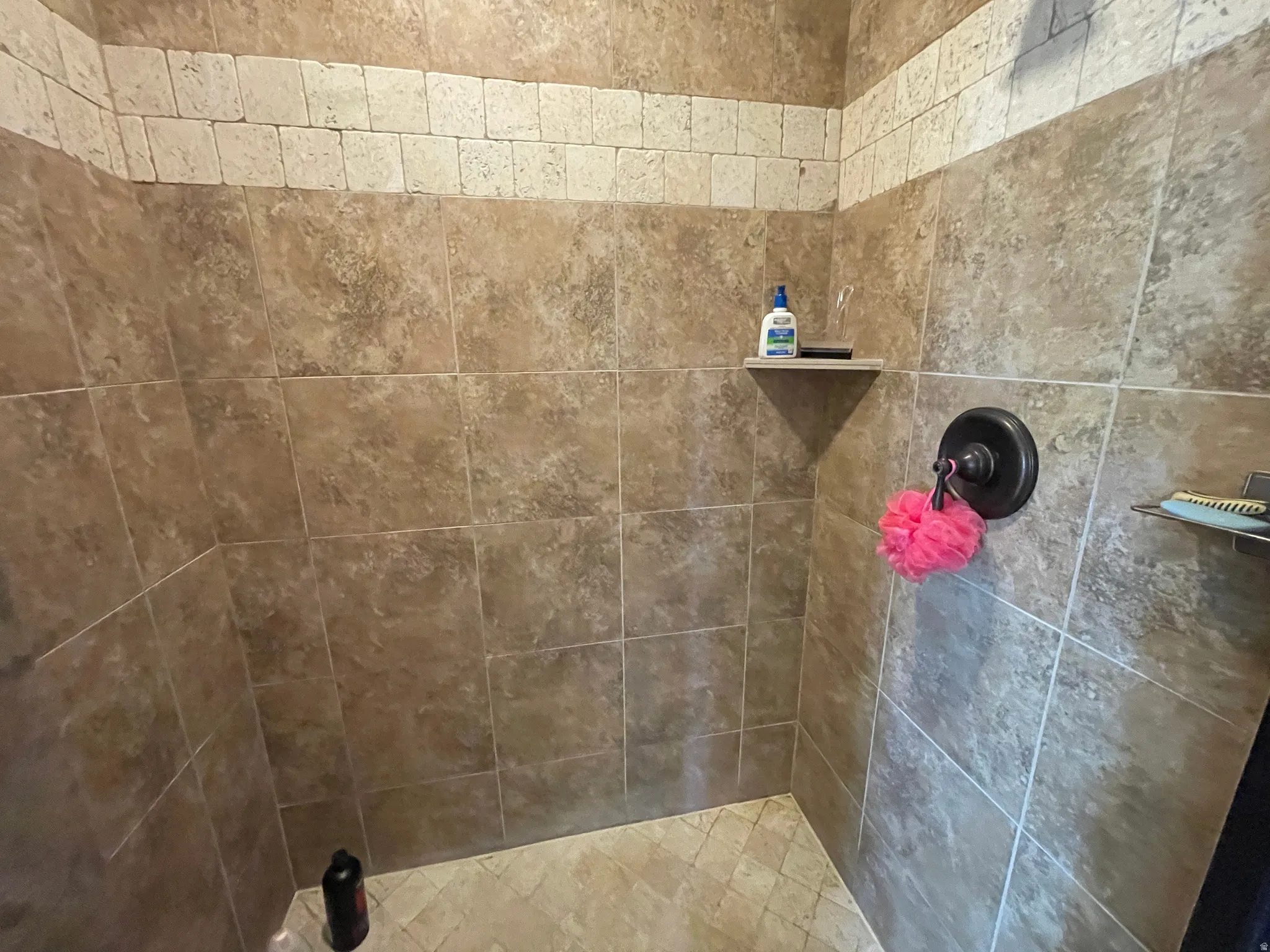 Full bath with tiled shower