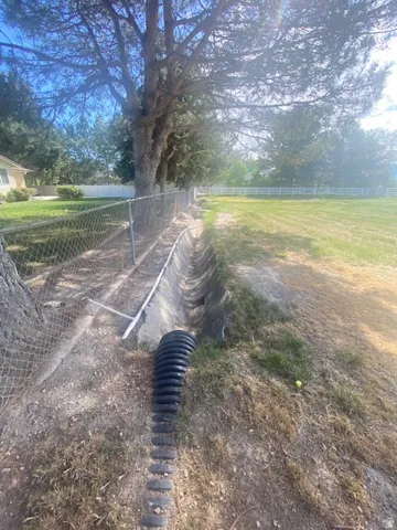 View of irrigation ditch that is located just to the north of the property.  Irrigation does not run with this property but owner may opt to purchase or lease their own water share.