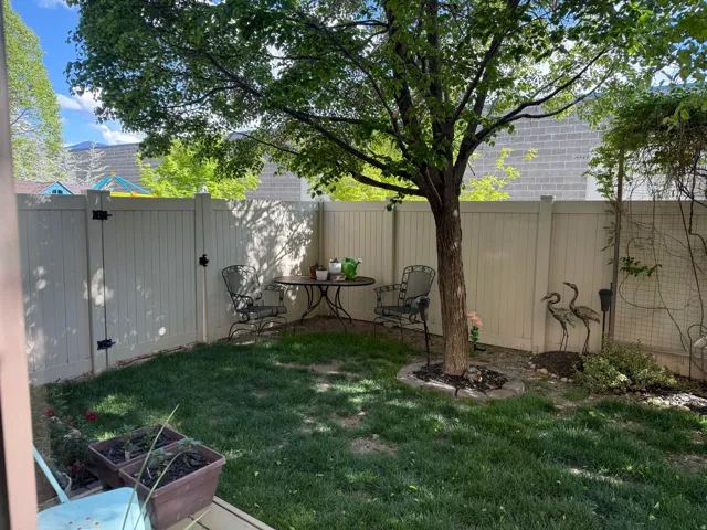 View of fenced backyard