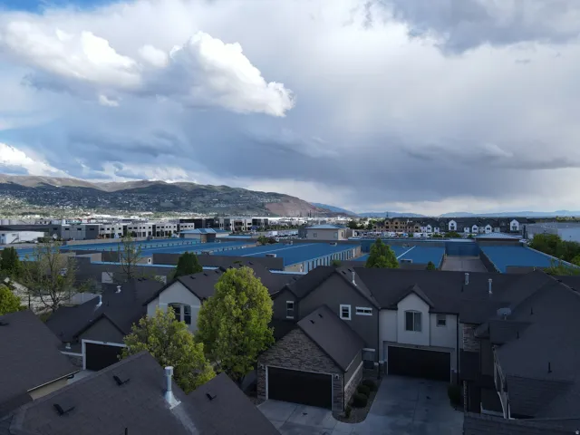 Aerial view  looking southeast of a mountainous background