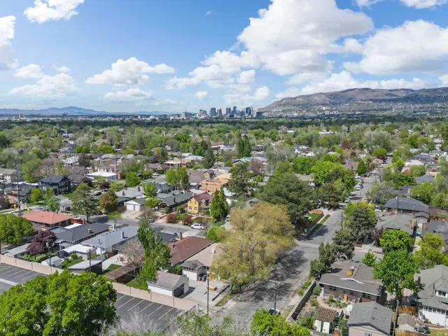 Aerial perspective of suburban area with mountains and skyline