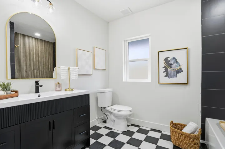 Full bath with vanity, light flooring, a tub to relax in, and a shower