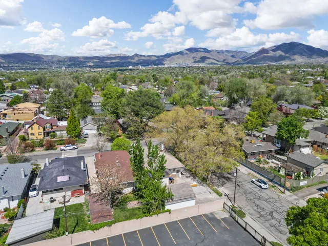 Aerial view of residential area featuring mountains