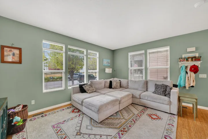 Living area featuring light wood finished floors and baseboards