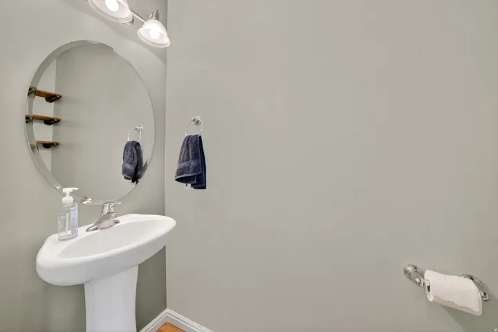Bathroom with baseboards and a sink