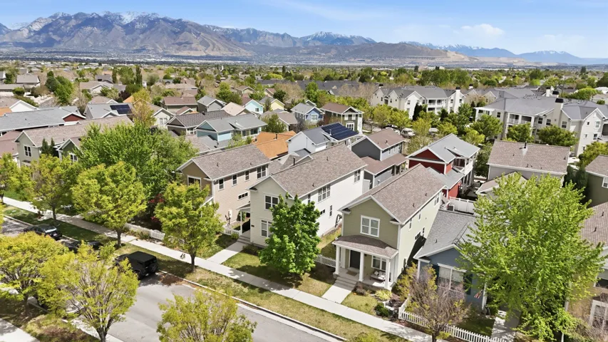Aerial view of residential area featuring a mountain backdrop