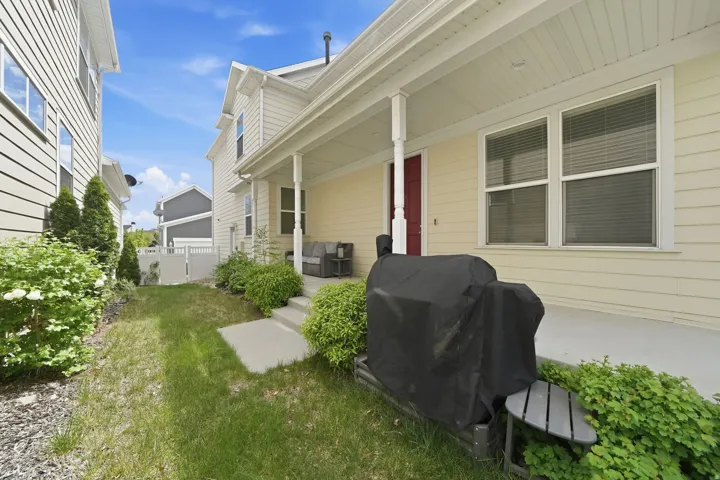 View of yard featuring covered porch