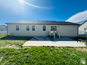 Rear view of house with a patio area