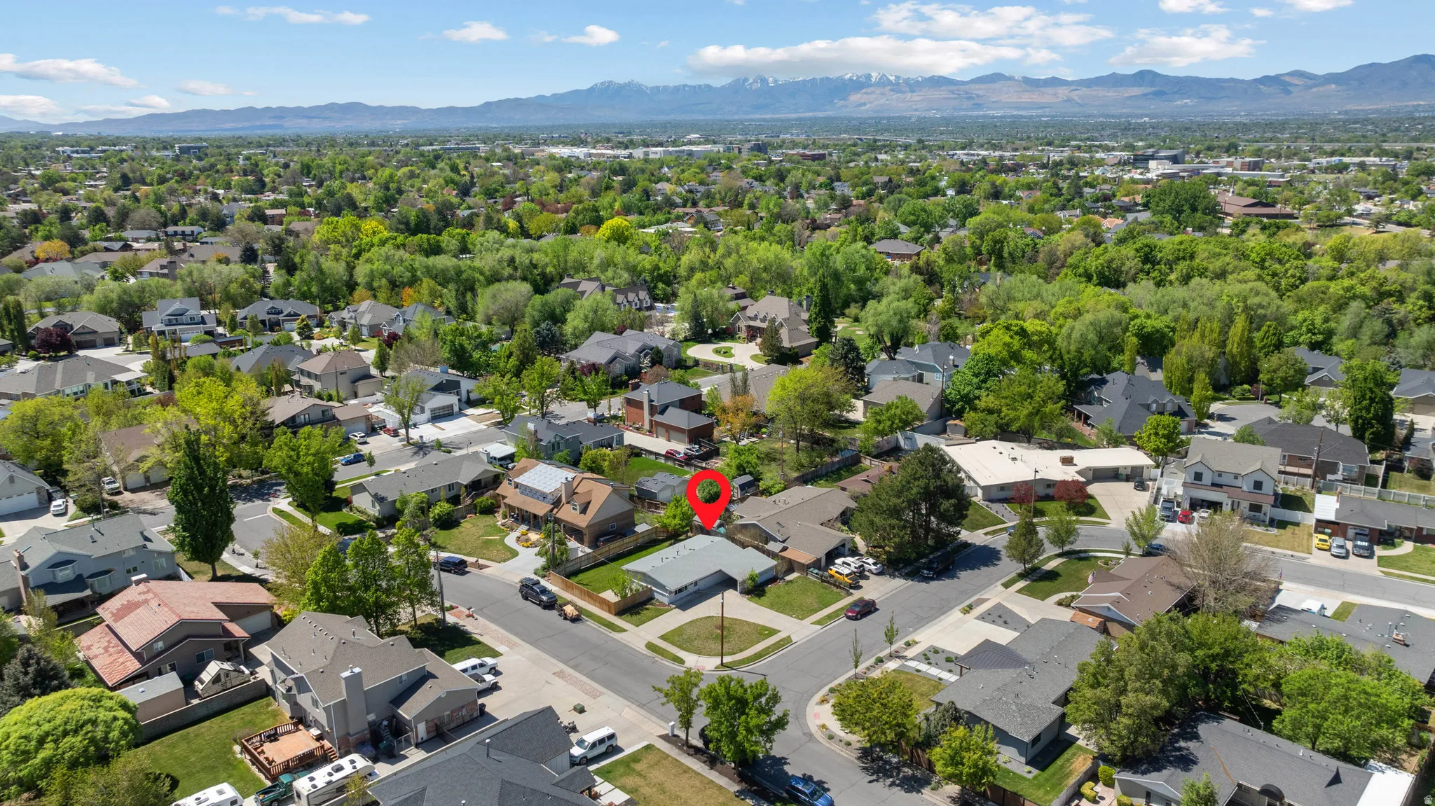 Aerial perspective of suburban area with mountains