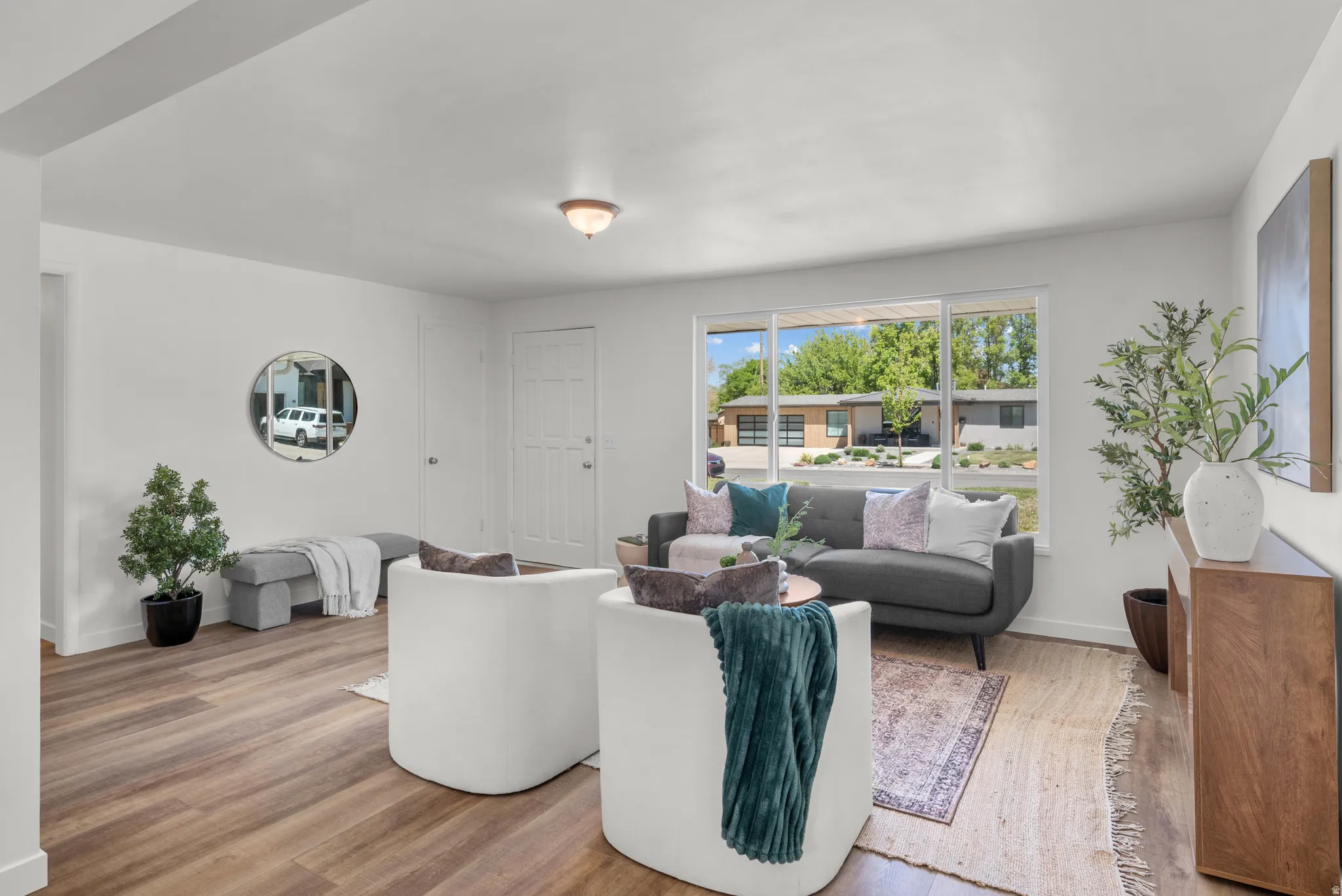 Living area featuring wood finished floors and baseboards