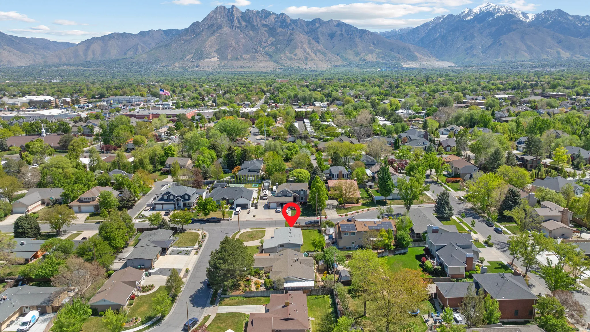 Aerial perspective of suburban area with mountains