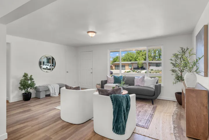 Living area featuring wood finished floors and baseboards