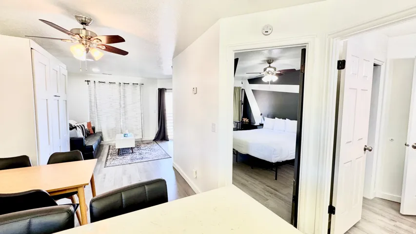 Bedroom featuring light wood-style floors and a textured ceiling