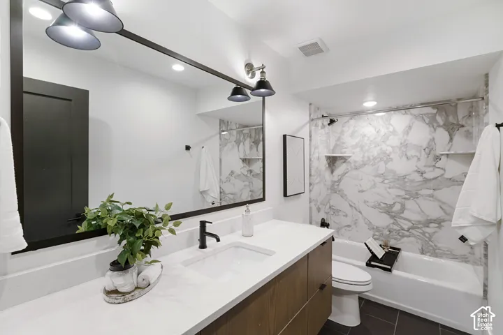 Bathroom with Quartz. Raised Vanity,  Large Framed Mirror