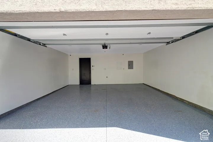 Finished with EV Charging, Epoxy Floor, Insulated Garage Door, Hose Bib