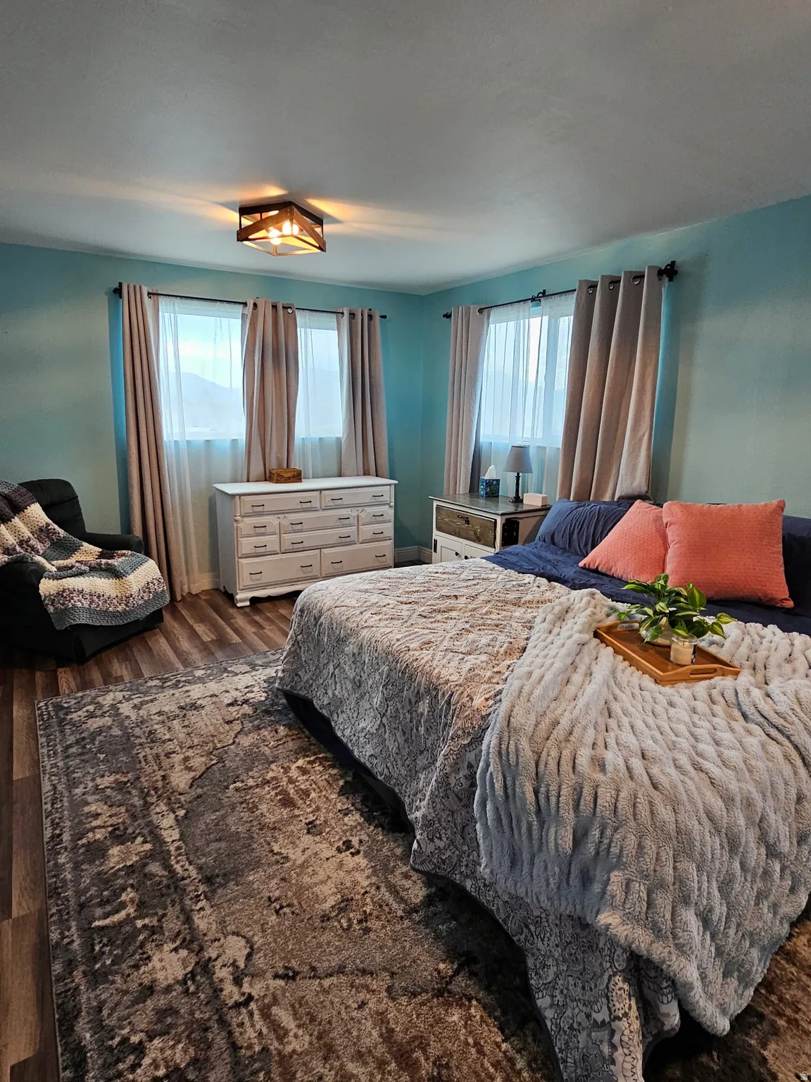 Bedroom with dark wood finished floors