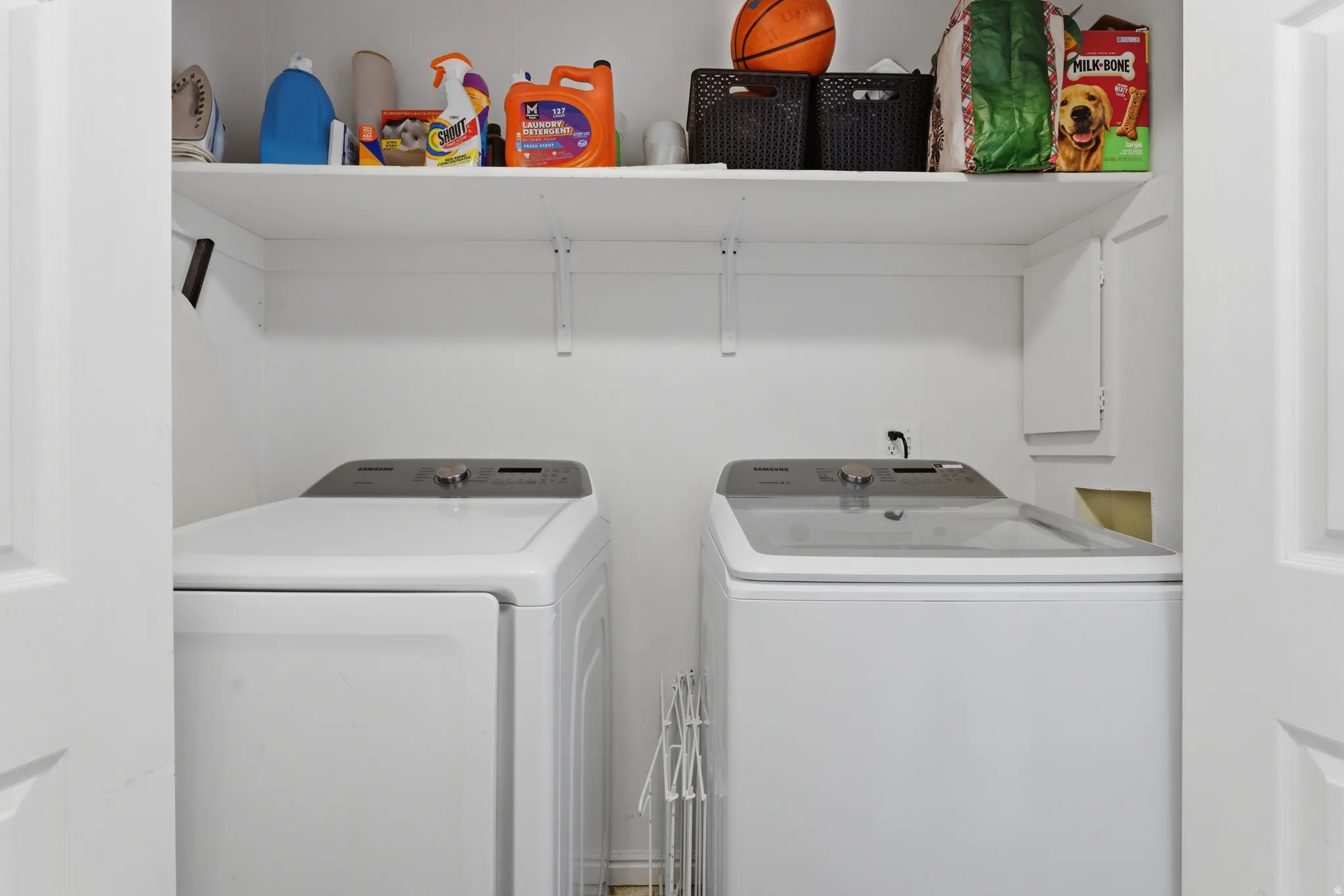 Laundry area with washer and clothes dryer