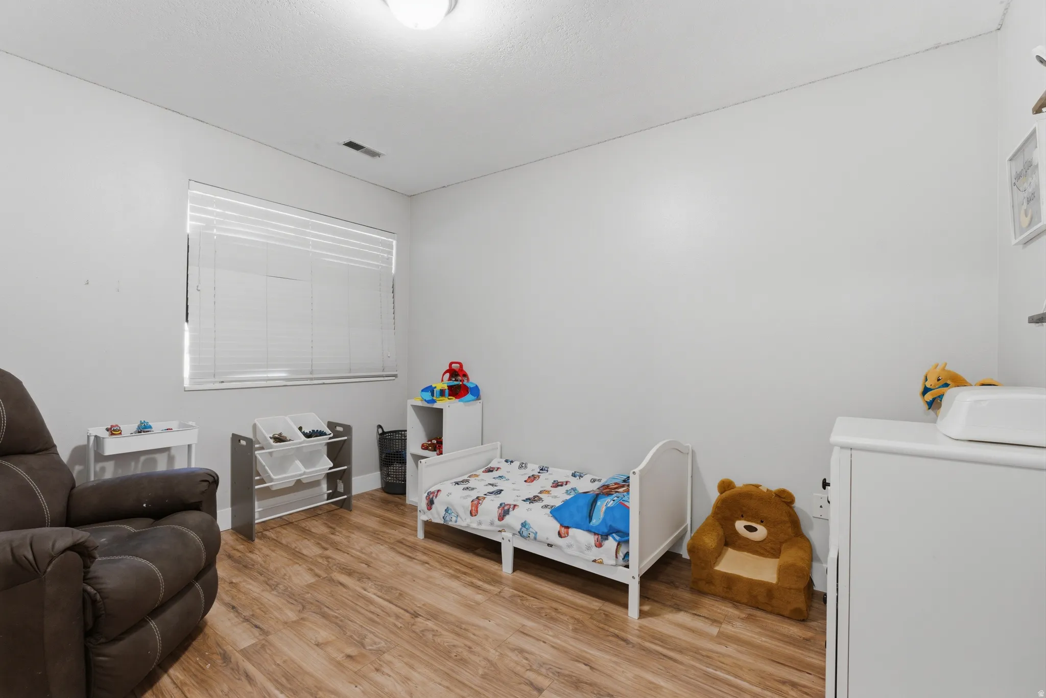 Bedroom featuring light wood-style floors