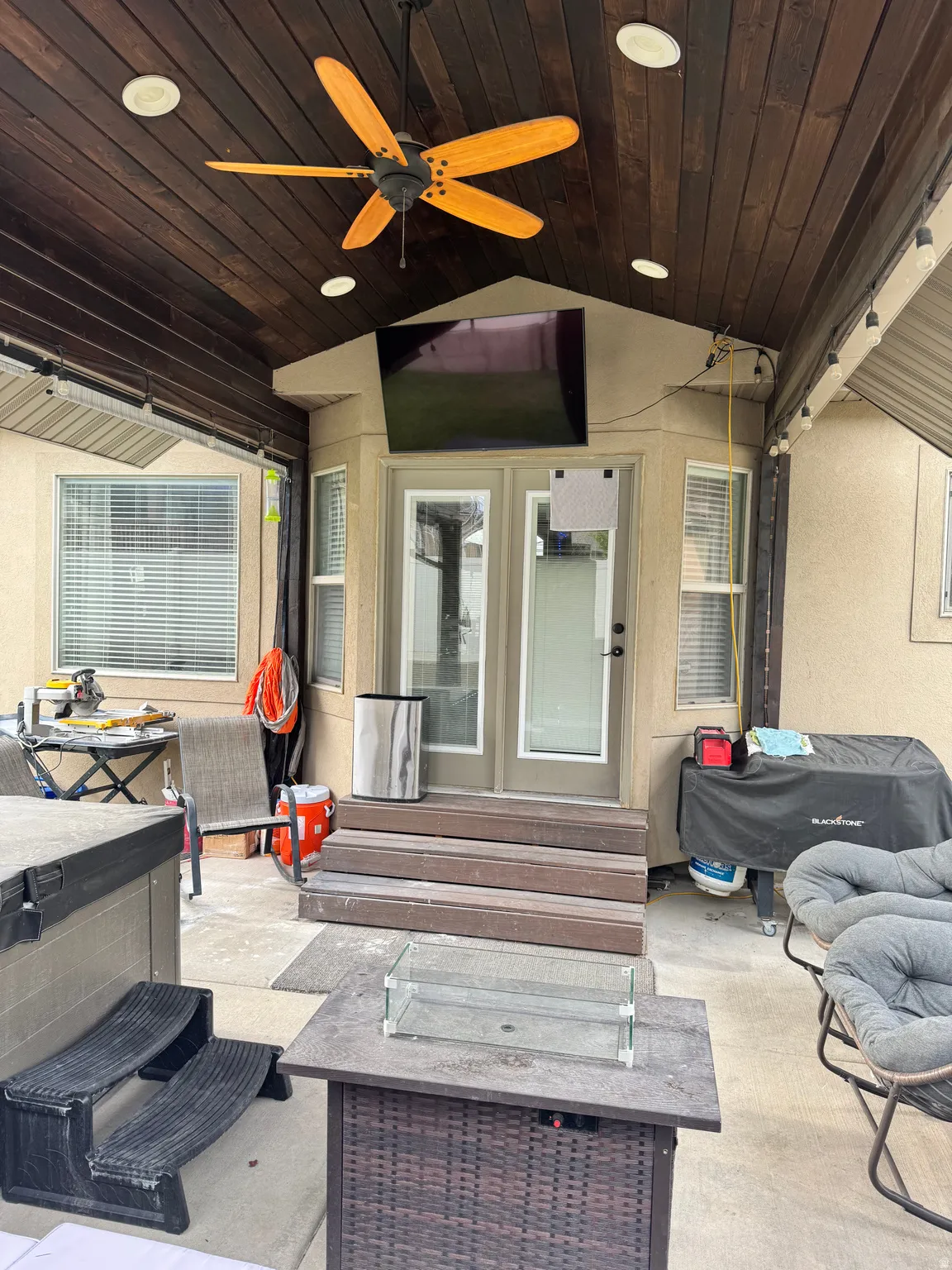 View of patio / terrace with a ceiling fan and french doors