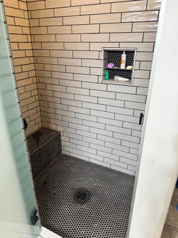 Bathroom view of a stall shower