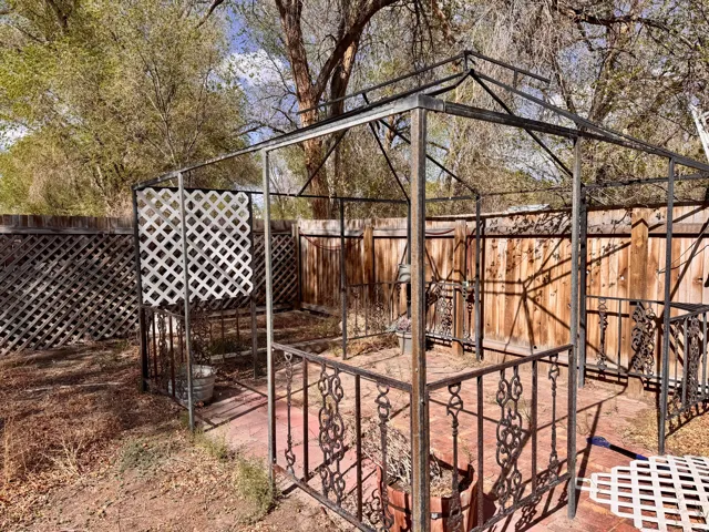 View of fenced backyard