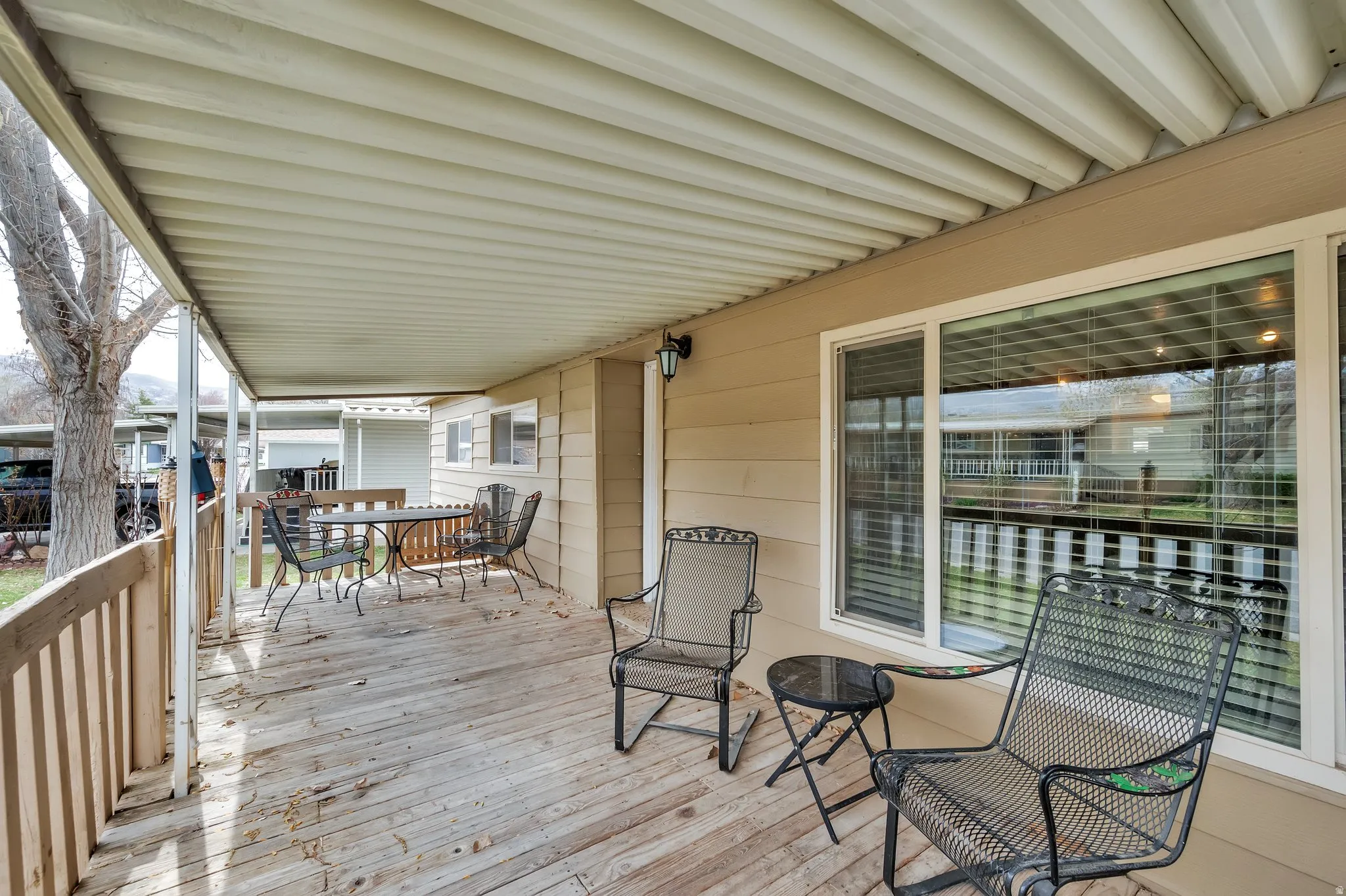 Wooden deck with outdoor dining space