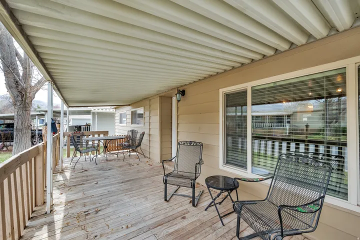 Wooden deck with outdoor dining space