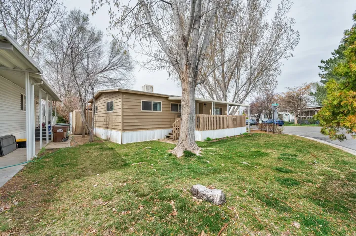 View of front of property with a front yard