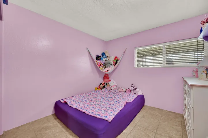 Bedroom featuring a textured ceiling