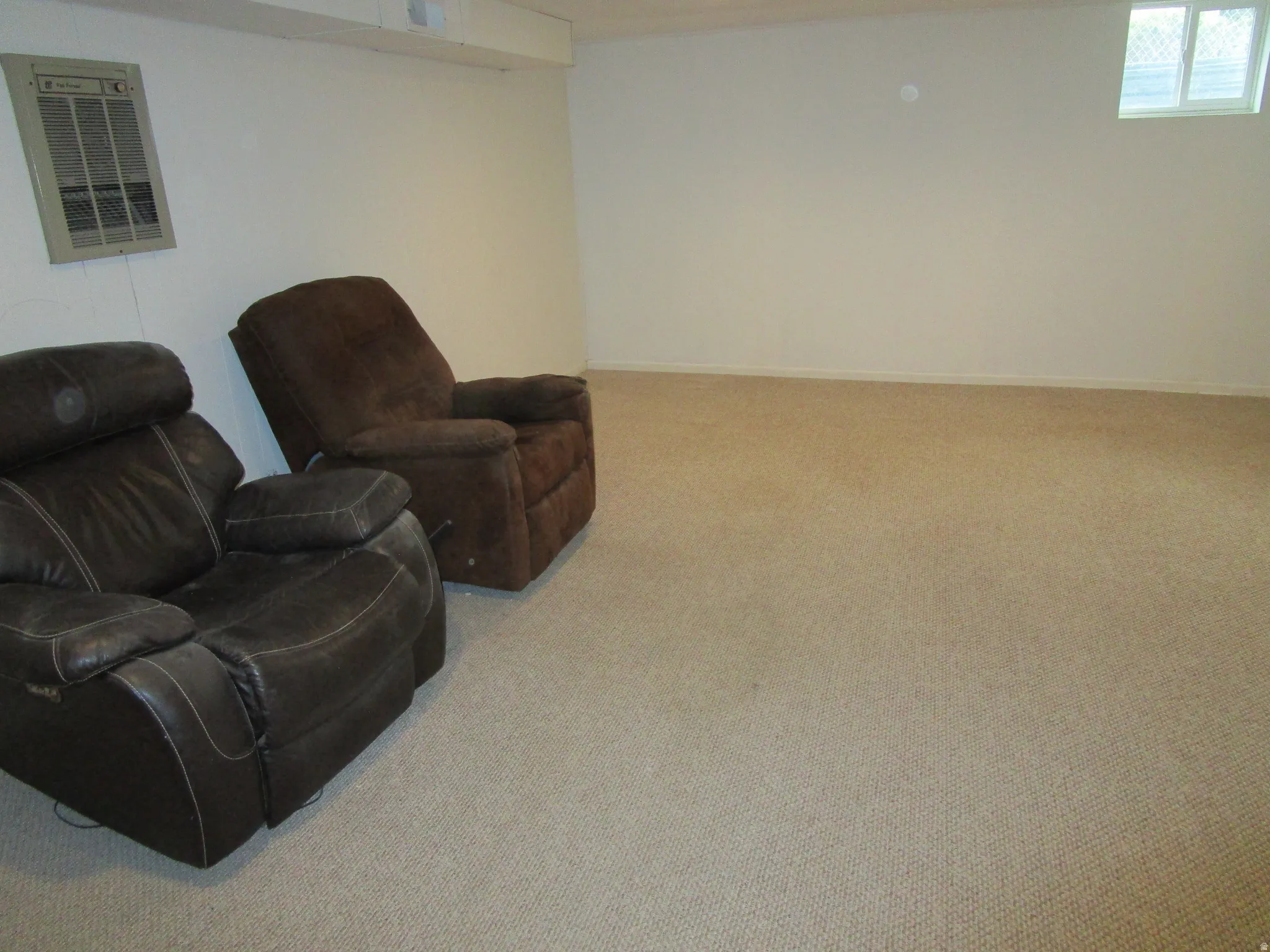 Living area featuring carpet
