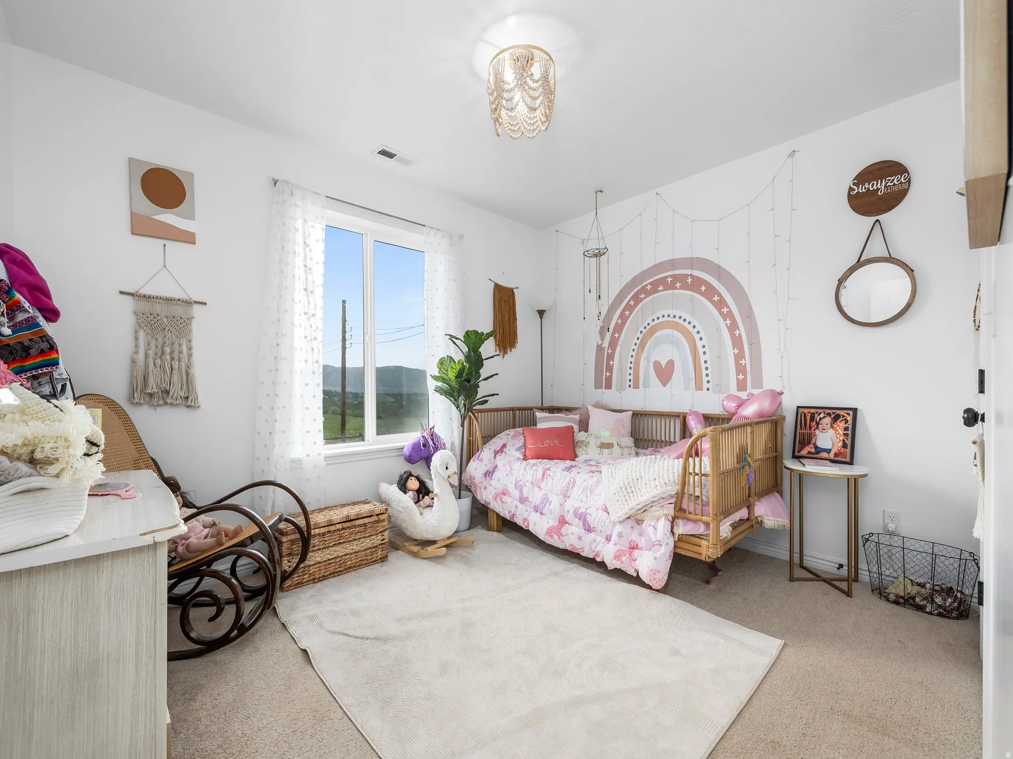 Carpeted bedroom with baseboards