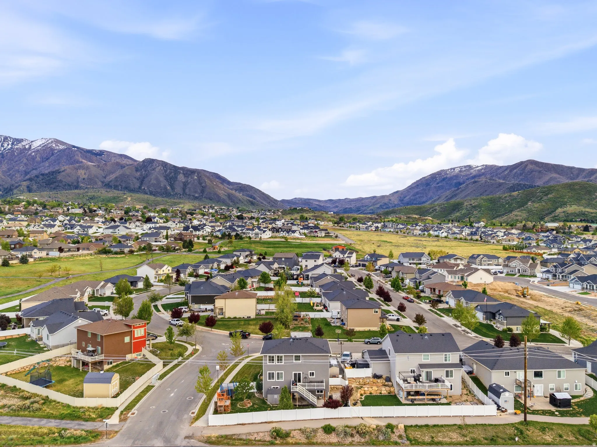 Aerial perspective of suburban area featuring mountains