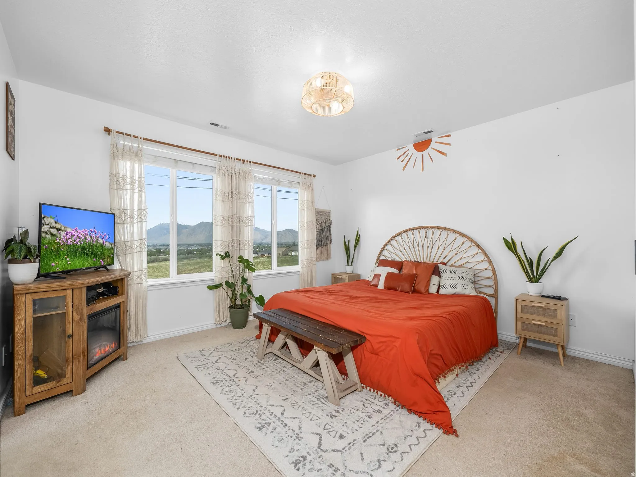 Carpeted bedroom featuring baseboards