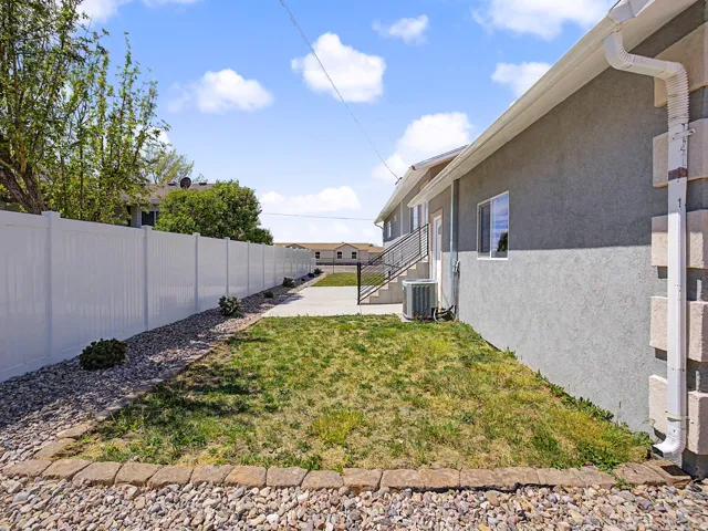View of fenced backyard