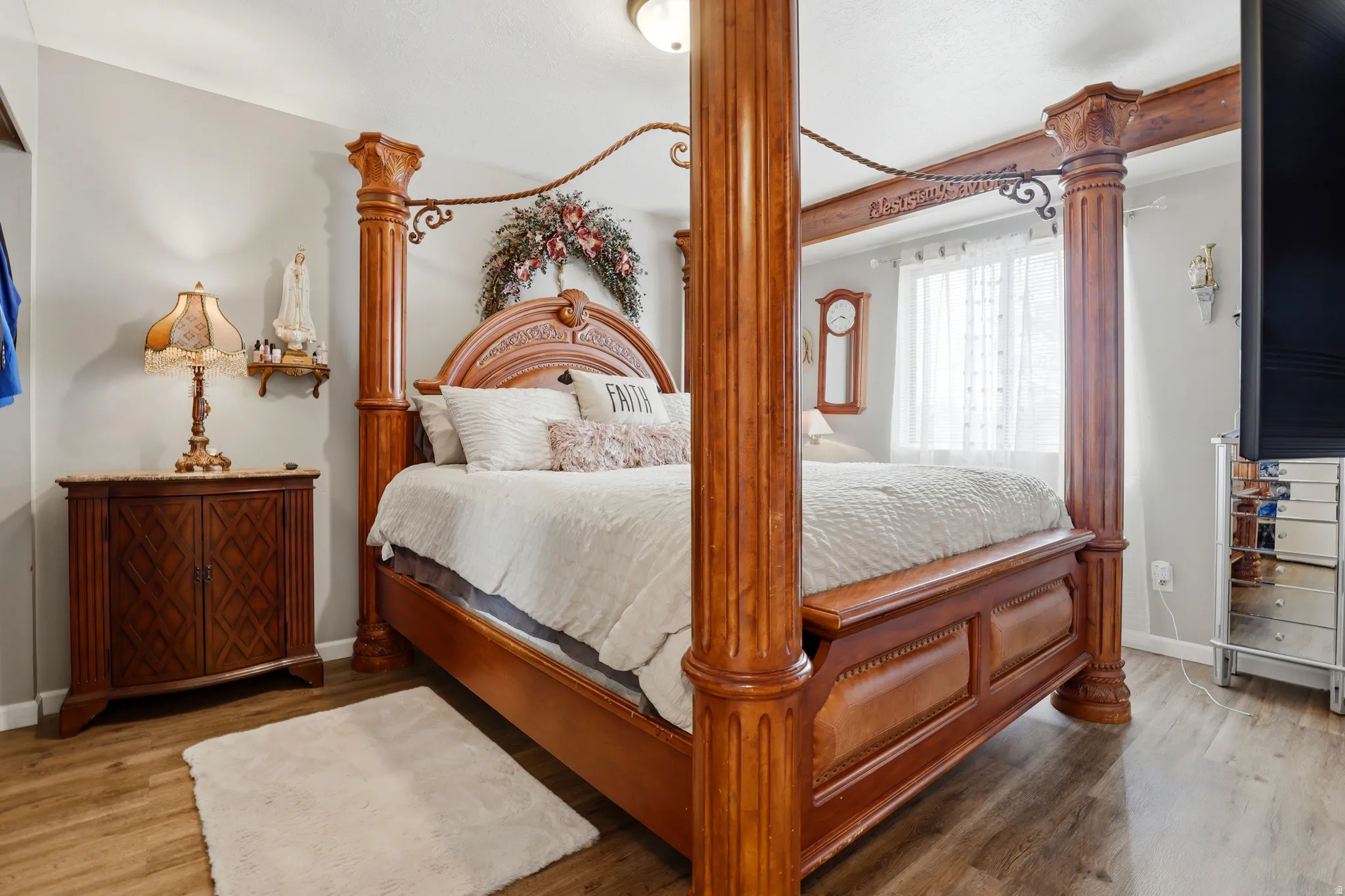 Bedroom featuring wood finished floors