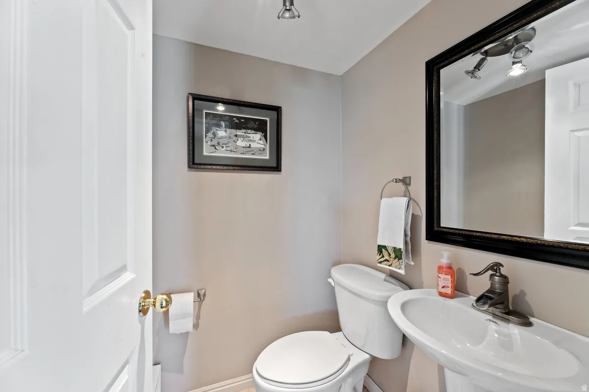 Bathroom featuring toilet and a sink