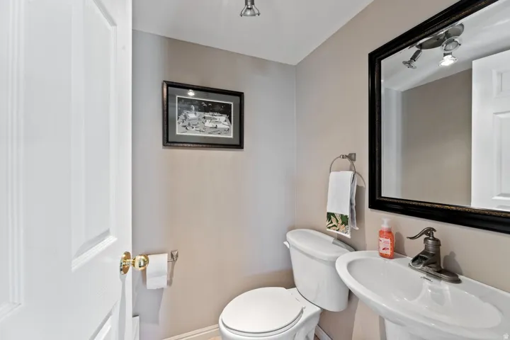 Bathroom featuring toilet and a sink